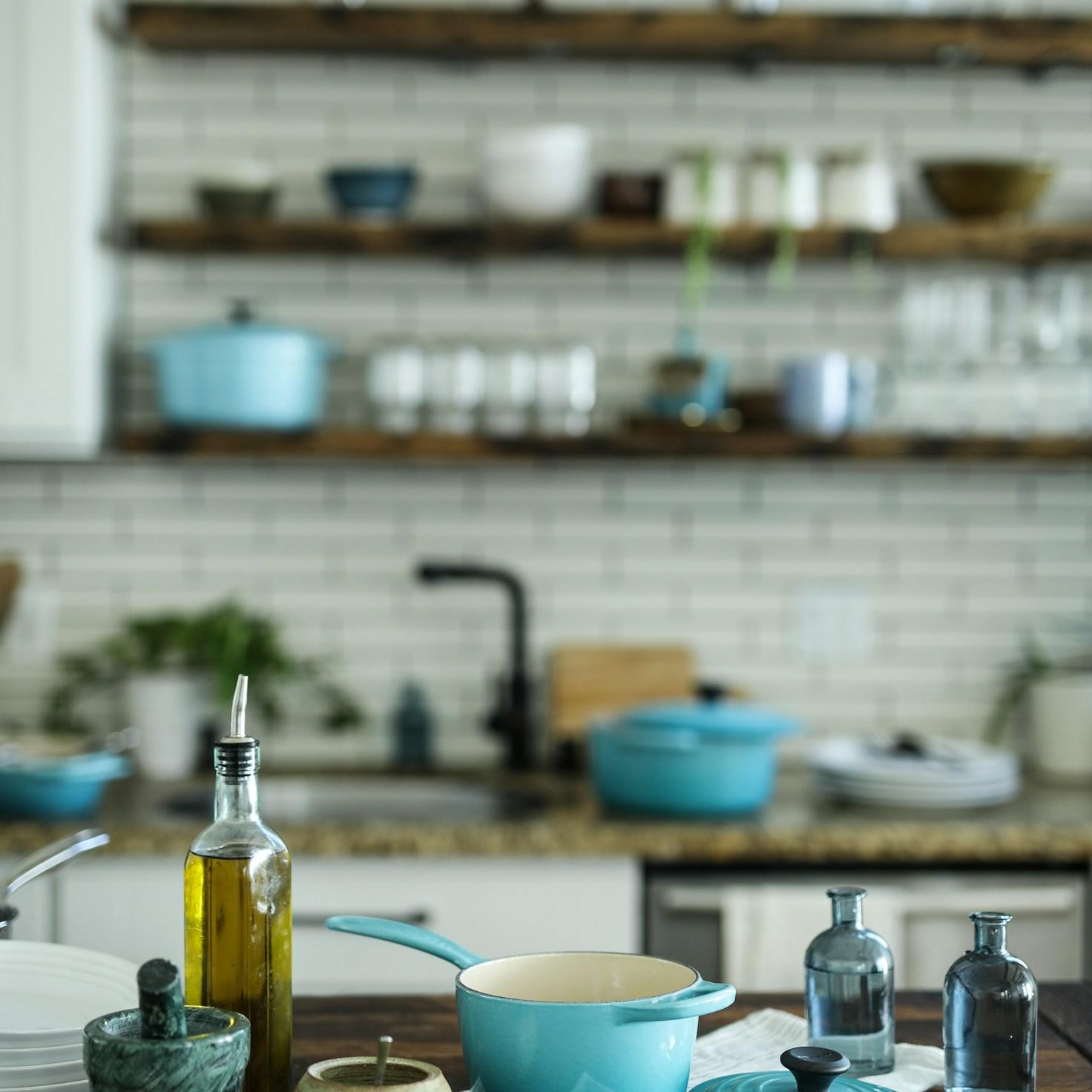 Diverse group of community members sharing a meal together, showcasing the social bonds formed through collaborative cooking